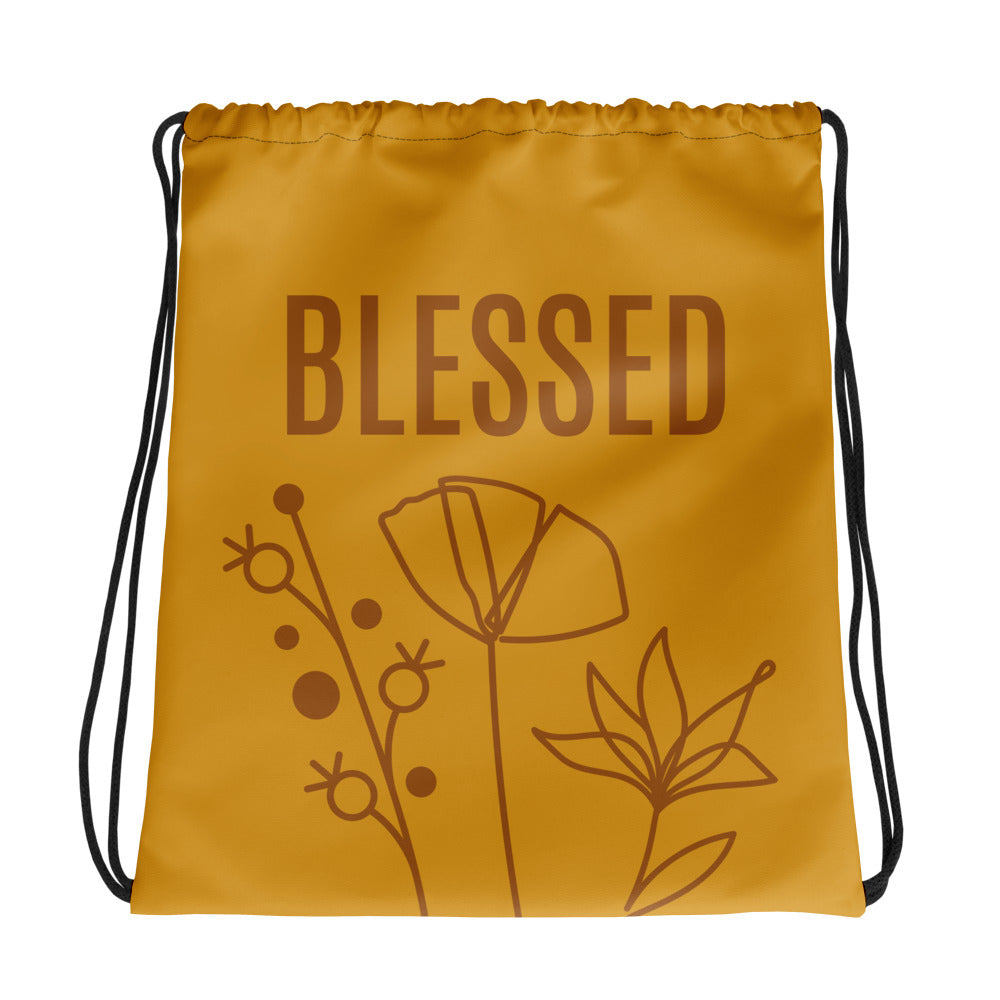 Mustard-color drawstring bag with BLESSED text and monoline flower design